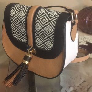 Aldo crossbody saddle purse with tassel